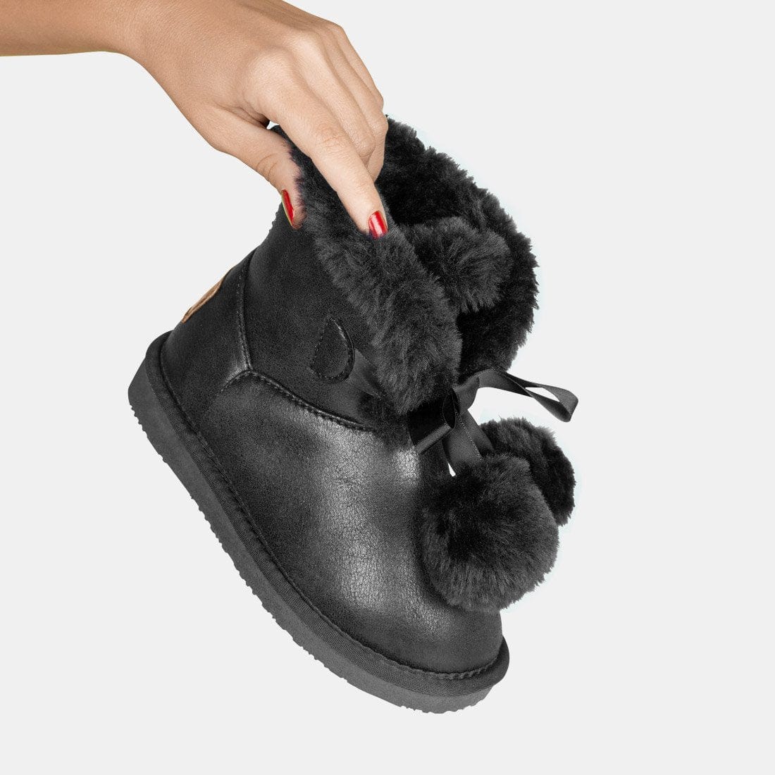 Botas negras niña
